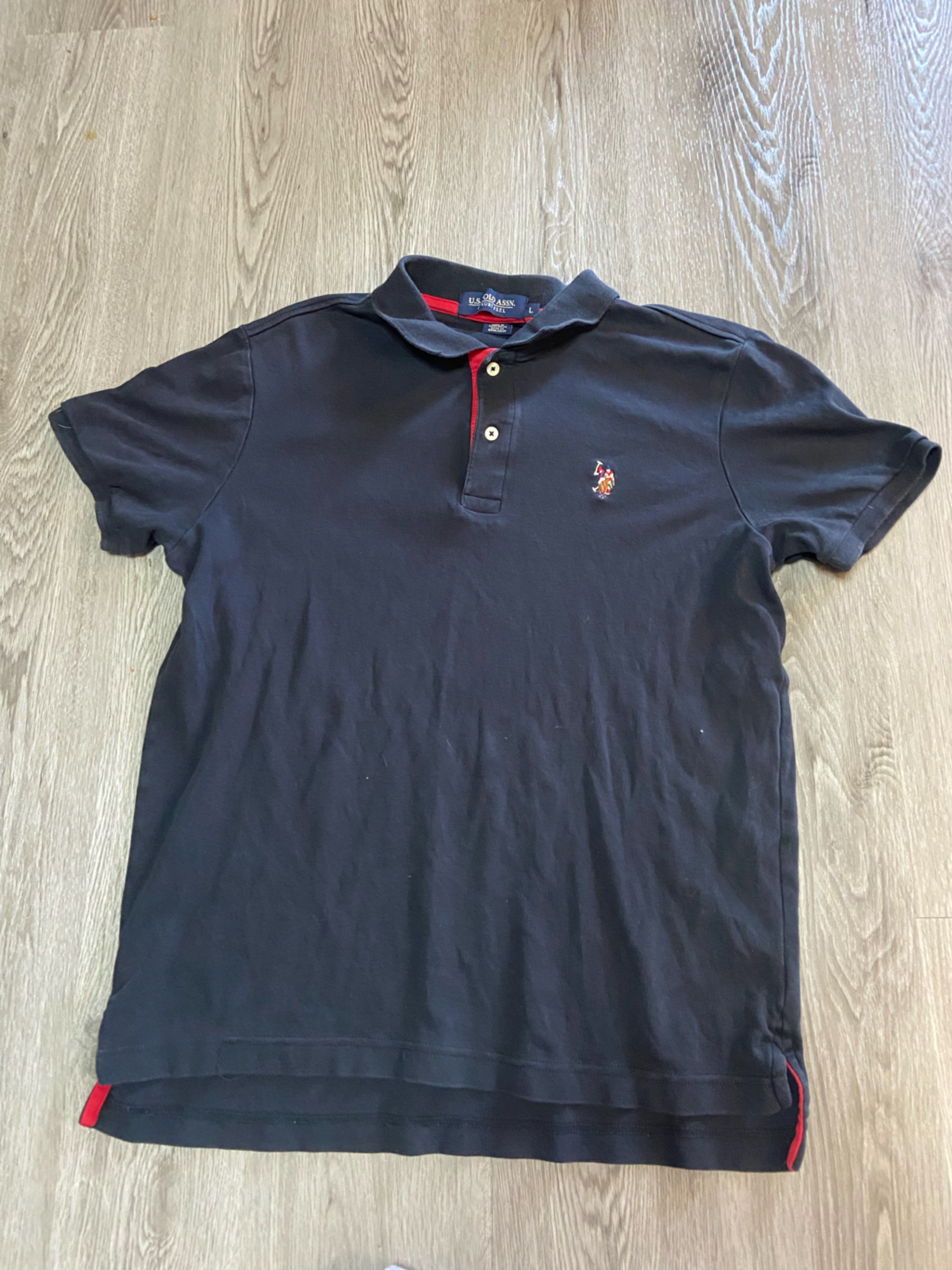 U.S. Polo Assn. Black Polo With Red Trim And Embroidered Logo